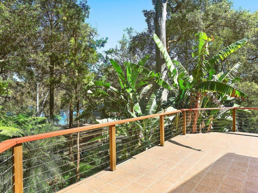 Spacious family treetop house with water views and island lifestyle