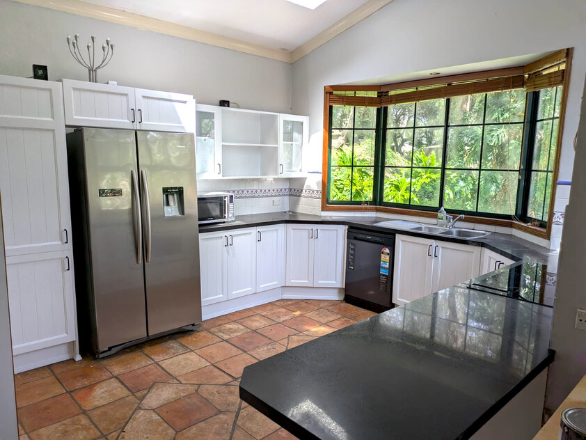 Spacious family treetop house with water views and island lifestyle
