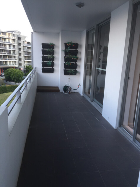 Rare Fully Furnished Apartment in resort style cul-de-sac living in private bayside residence with uninterrupted sparkling water views