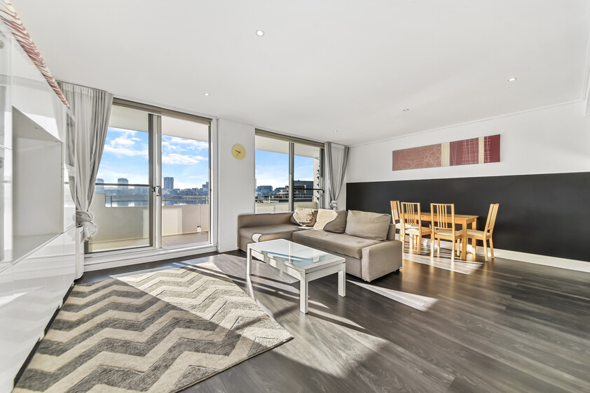 Rare Fully Furnished Apartment in resort style cul-de-sac living in private bayside residence with uninterrupted sparkling water views