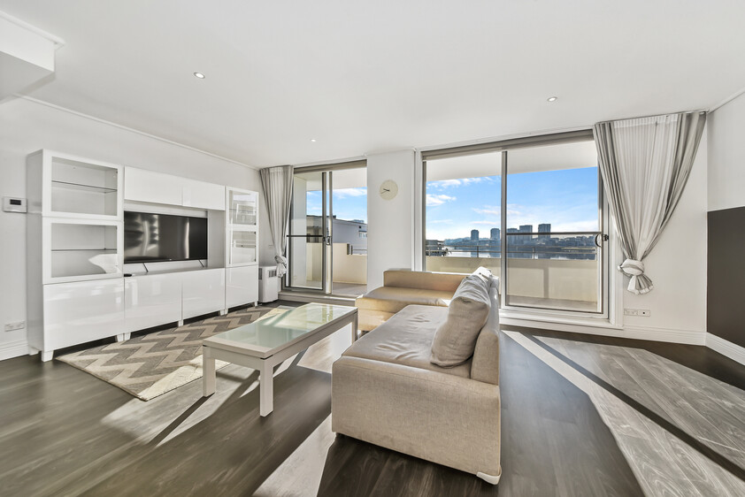 Rare Fully Furnished Apartment in resort style cul-de-sac living in private bayside residence with uninterrupted sparkling water views