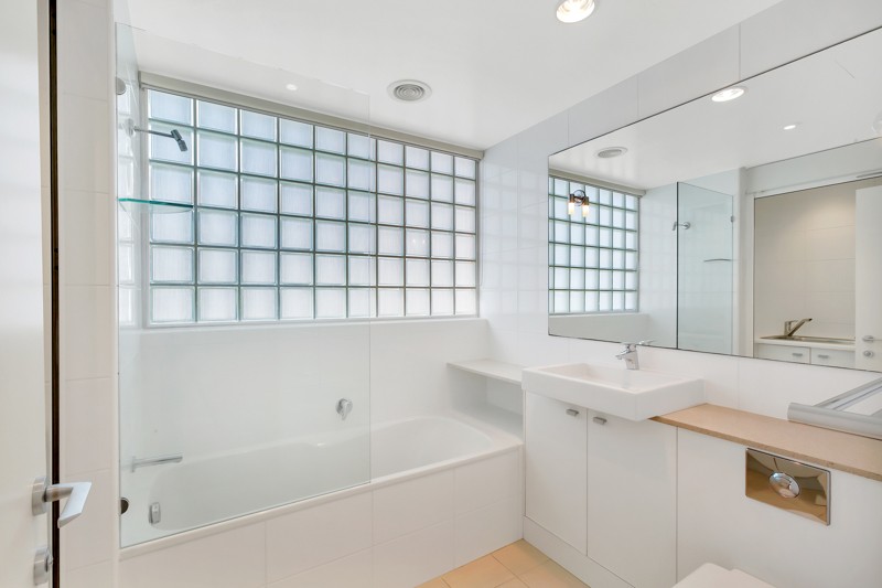 AS NEW, DESIGNER APARTMENT — BATHED IN SUNLIGHT