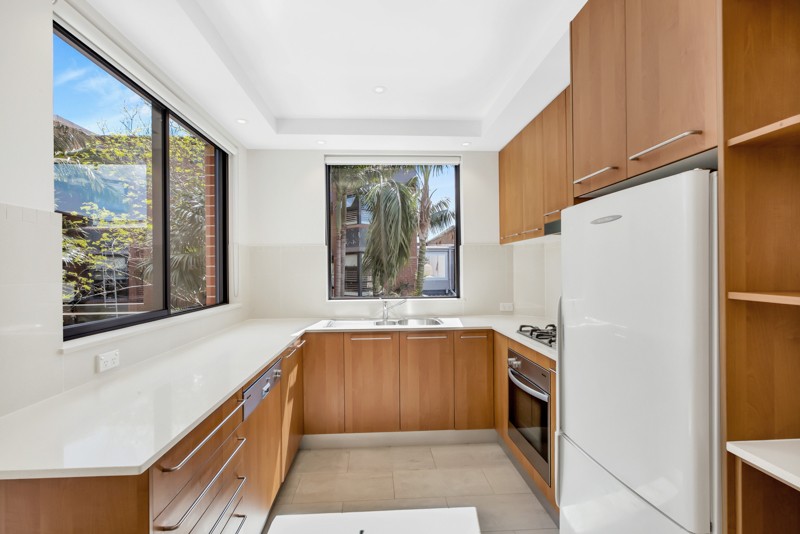 AS NEW, DESIGNER APARTMENT — BATHED IN SUNLIGHT