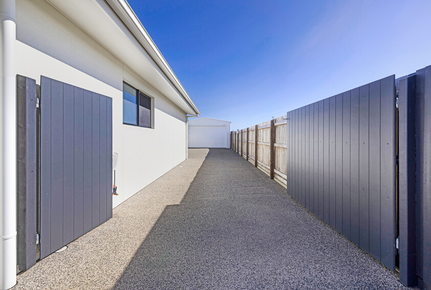 Architecturally Designed Coastal Luxury with Premium Entertaining & Massive Powered Shed