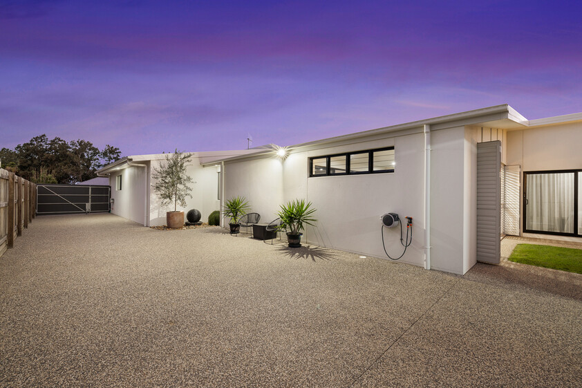 Architecturally Designed Coastal Luxury with Premium Entertaining & Massive Powered Shed