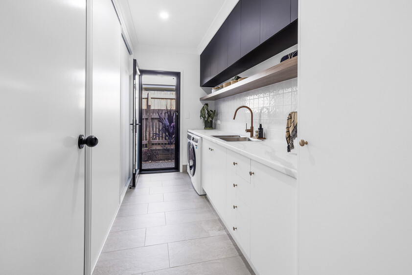 Architecturally Designed Coastal Luxury with Premium Entertaining & Massive Powered Shed