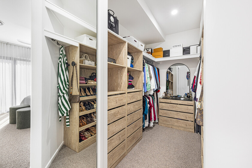 Architecturally Designed Coastal Luxury with Premium Entertaining & Massive Powered Shed