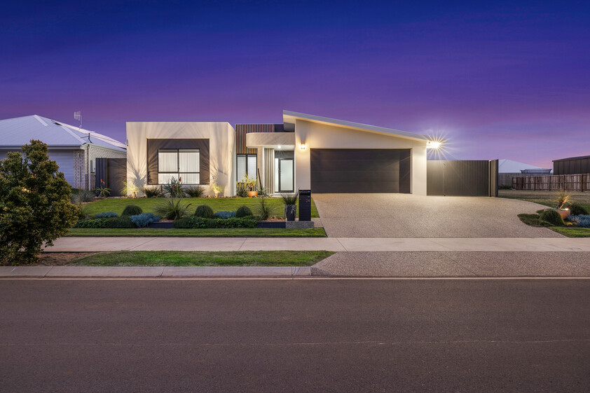 Architecturally Designed Coastal Luxury with Premium Entertaining & Massive Powered Shed