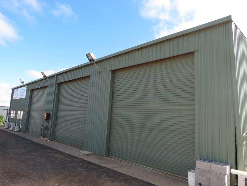 High-Clearance Industrial Warehouse with Quality Offices & Secure Yard Available Now
