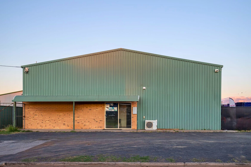 High-Clearance Industrial Warehouse with Quality Offices & Secure Yard Available Now