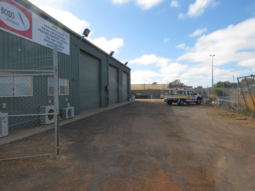 High-Clearance Industrial Warehouse with Quality Offices & Secure Yard Available Now