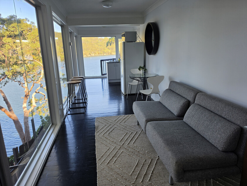 UNDER OFFER - Serene Waterfront Sanctuary with 360-Degree Water Views - Fully Furnished 1 Bed Studio