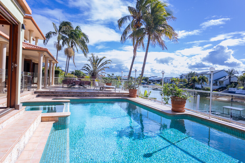 Rare North-to-Water Benowa Waters Residence with 32.1m Frontage & Modern Private Pontoon
