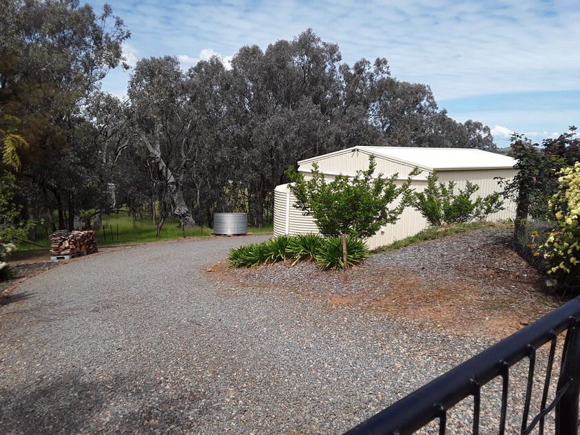 Elevated 3-Acre Lifestyle Property with Beautiful Views, Sheds, Solar, and More