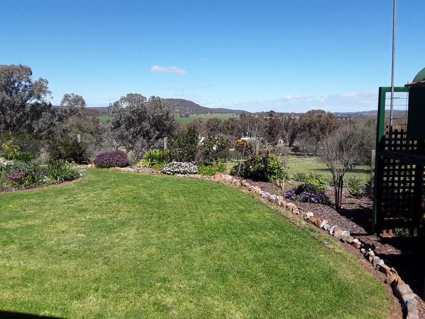 Elevated 3-Acre Lifestyle Property with Beautiful Views, Sheds, Solar, and More