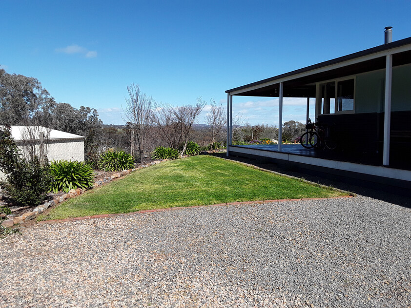 Elevated 3-Acre Lifestyle Property with Beautiful Views, Sheds, Solar, and More