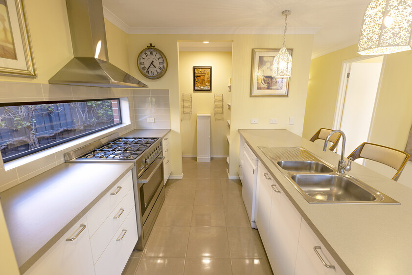 Rare parkfront opportunity with privacy, style and easy living.