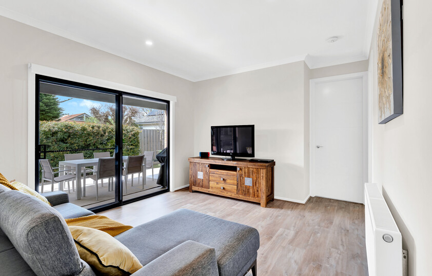 Spacious Modern Family Living in Prime McKinnon High School Zone