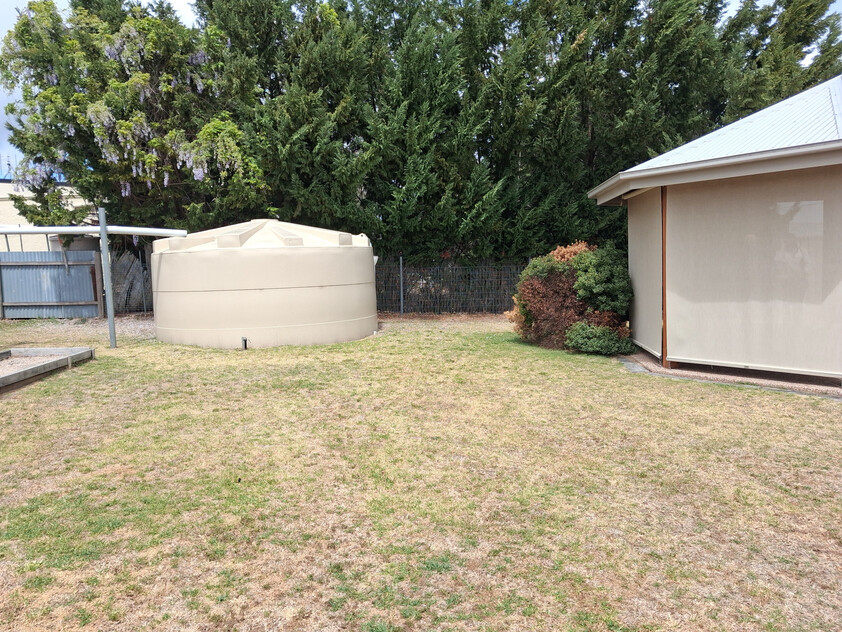 Solid home on large block, close to all town amenities